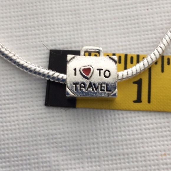 Woman’s Bracelet with one charm that reads I love to travel color sliver.NWOT - Picture 2 of 4